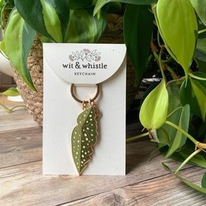 Wit & Whistle enamel keychain